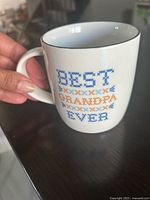 Front view of mug showing text and handle