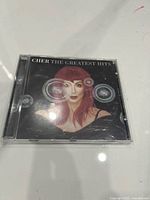 Front cover of Cher The Greatest Hits CD case