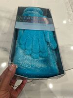 Boxed turquoise scarf, gloves and earmuffs set angled view