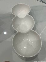 Top view of white ceramic three-section condiment dish