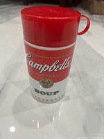 Front view of Campbell's Soup thermos with lid attached
