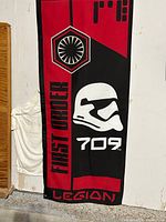Full view of vertical First Order 709th Legion banner flag hanging