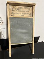 Full view of washboard showing frame and metal panel