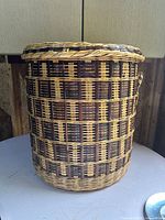 Full view of cylindrical wicker basket