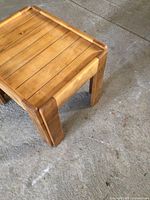 overhead angled view showing tabletop slats and legs