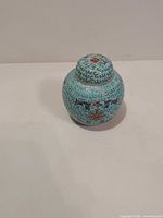 Full view of ginger jar front with lid on