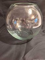 Side view of entire clear glass bowl