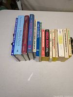 All books standing spine out showing titles