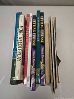 Spine view of eight books