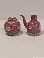 Front view of ginger jar and soy pot showing pattern and form