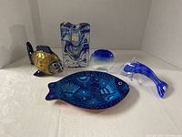 Group shot of all five blue-themed decor items