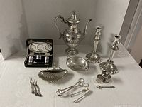 Full lot overview showing all silver-plated items