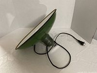 Full pendant light showing shade interior and cord