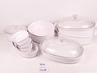Full view of all white CorningWare dishes and lids