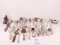 Full view of all 62 silverplate items laid out on surface