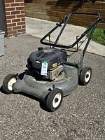 Full view of Craftsman 21" mower showing deck, handle and wheels