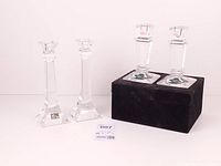All four crystal candlestick holders, Mikasa pair left, Shannon pair on box right