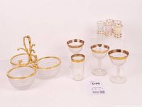Full lot showing bowls in caddy, coupe glasses, shot glass and pastel cups