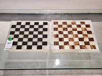 Both marble chess boards side by side