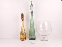 Three glass items side by side