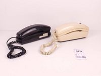 Both telephones side by side showing overall appearance