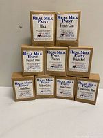 Front view of all nine Real Milk Paint Co boxes in two stacks