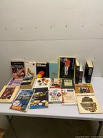 Overall view of table with full assortment of books