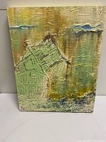 Front view of textured abstract oil painting