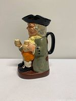 Left side view of Royal Doulton Happy John character jug