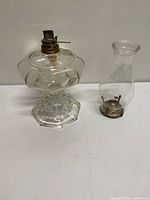Oil lamp base with chimney separated