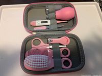 Open kit showing all baby care items secured in case