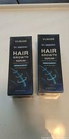 Front view of two sealed VLIGUDE 5% Minoxidil Hair Growth Serum boxes