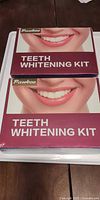 Front view of two sealed Pankoo Teeth Whitening Kit boxes