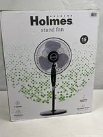 Front of sealed Holmes stand fan box showing product image and branding