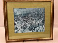 Front view of framed print with mat and frame visible