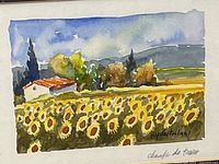 Close view of artwork showing sunflower field and signature