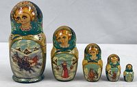 Front view of all six nesting dolls in descending size order