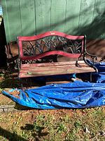 Front view of cast iron and wood garden bench