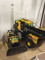 Front view of both Tonka vehicles showing scale