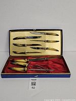 Open case showing full carving set