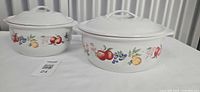 Both Corelle Chutney covered casseroles side by side