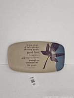 Front view showing full platter, quote, leaf graphic, overall condition