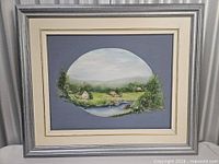 Full view of framed acrylic landscape painting