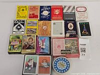 Overview of all 20 boxed decks laid out in 4×5 grid