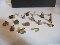 All 16 Wade Whimsies figures laid out