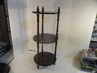 Full view of three-tier wooden stand