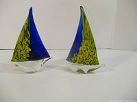 Both glass sailboats front view