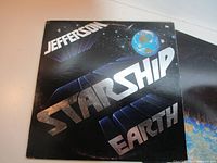 Front cover with Jefferson Starship Earth graphics