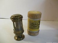 Lantern standing beside Kolibri tube