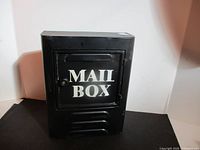 Front view showing MAIL BOX lettering and overall condition